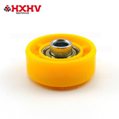 HXHV ბრტყელი ტიპის ყვითელი პომ პლასტმასის როლიკებით ბორბალი კონვეიერისთვის